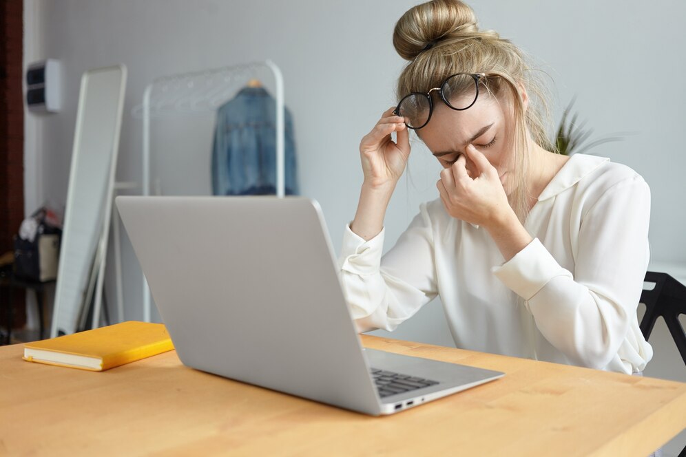 modern-technology-job-people-concept-portrait-tired-young-female-employee-with-hair-bun-taking-off-eyeglasses-massaging-her-nose-bridge-feeling-stressed-because-lot-work_343059-3052.jpg