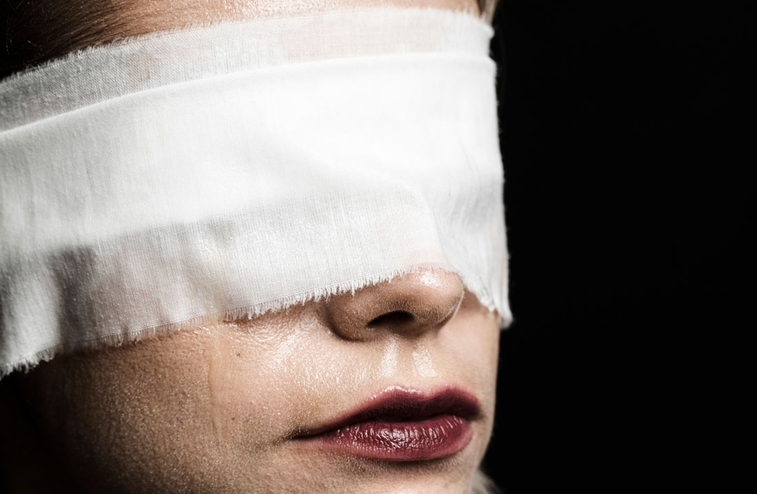 woman-with-blindfold-black-background.jpg