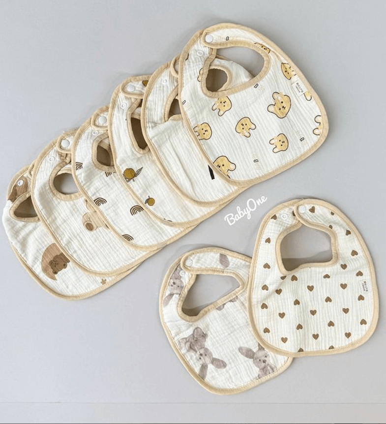 Слюнявчики муслиновые белый с бежевой окантовкой