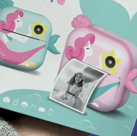 Фотоаппарат с принтером в виде русалочки