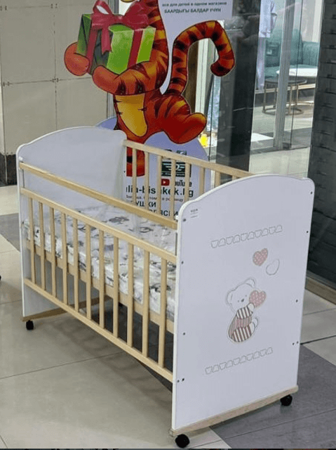 Детские кроватки «Колесо-качалка»