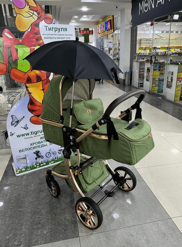Детская коляска цвет хаки с золотым
