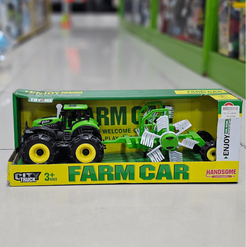 Детская игрушка Трактор