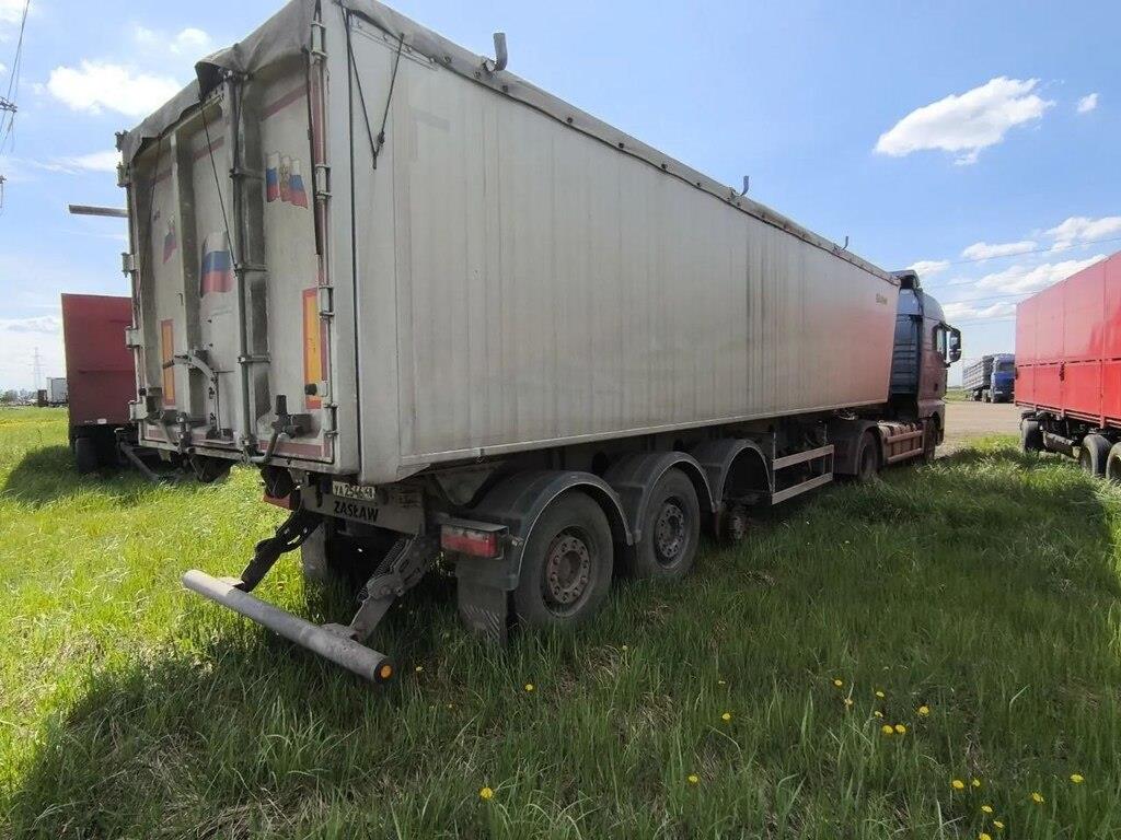 D-653A; специализированный, полуприцеп - самосвал