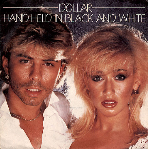 Dollar — Hand Held In Black And White