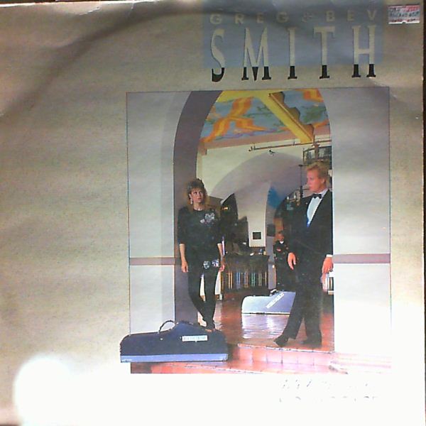 Smith Greg & Bev — Mr. & Mrs. Smith No Baggage