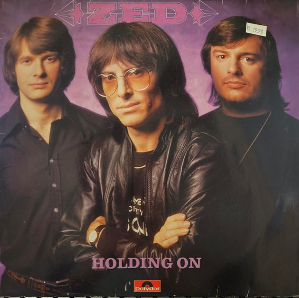 ZED (Jarvis Graham - Top-ranking session musician Camel, Deep Feeling '71 etc.; Jenkins Nigel - ex - Apollo 100; Westwood Paul - session musician with Vangelis, Hot Chocolate, Moody Blues, Thompson Barbara, etc.) — Holding On