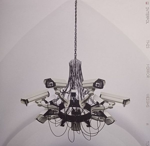 INTERPOL — THIS MIRROR WEIGHS A TON