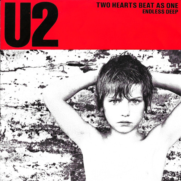 U2 — Two Hearts Beat As One