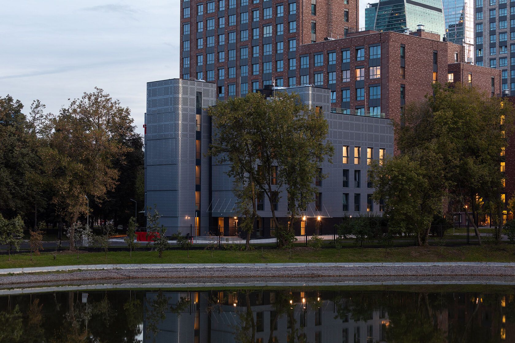 Facade viewed across the pond