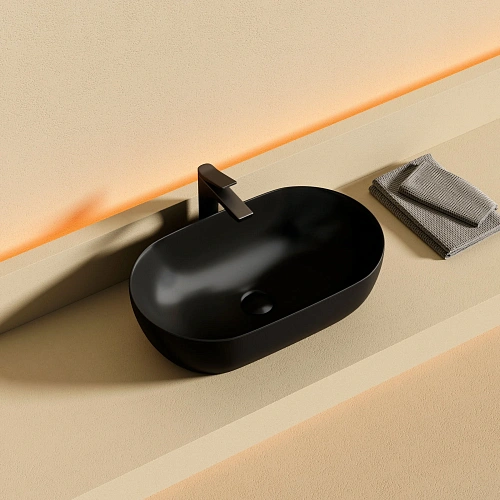 Раковина Ceramica Nova Twist CN12001MB накладная овальной формы 500x300x140 черный матовый Раковина Ceramica Nova Twist CN12001MB накладная овальной формы 500x300x140 черный матовый