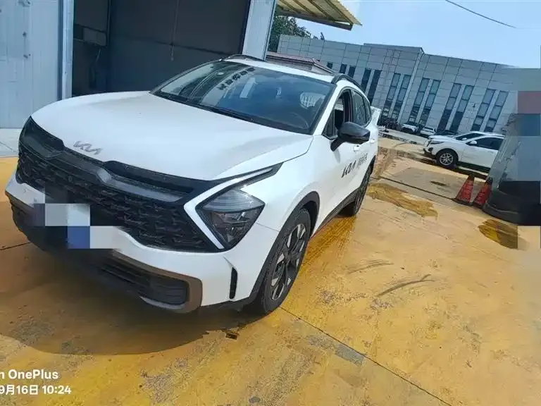 Kia Sportage — фото 1