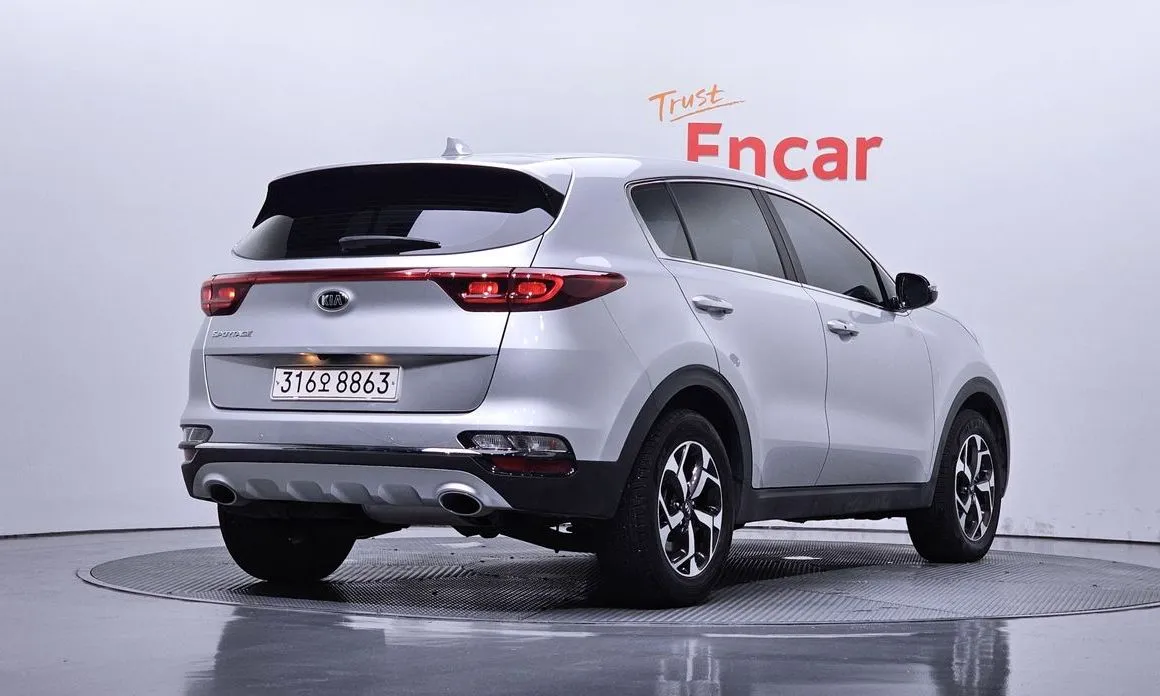 Kia Sportage — фото 4