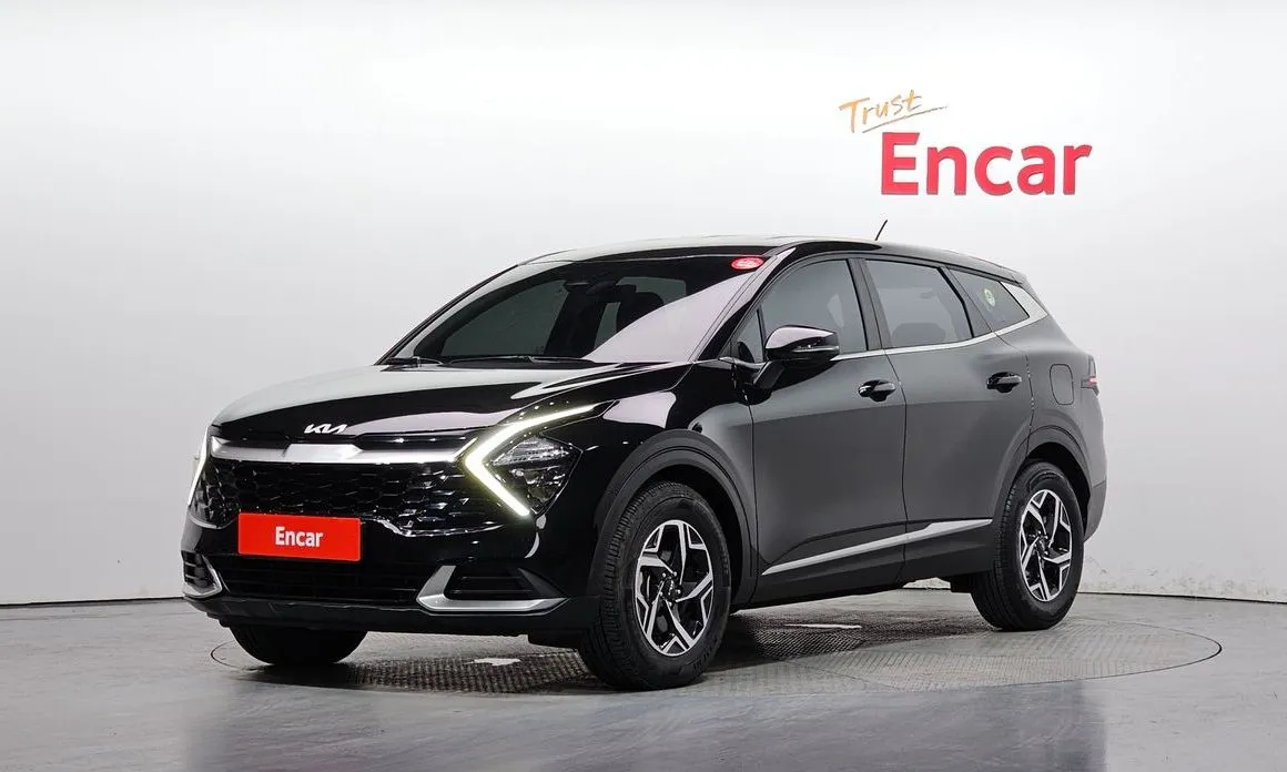 Kia Sportage — фото 1