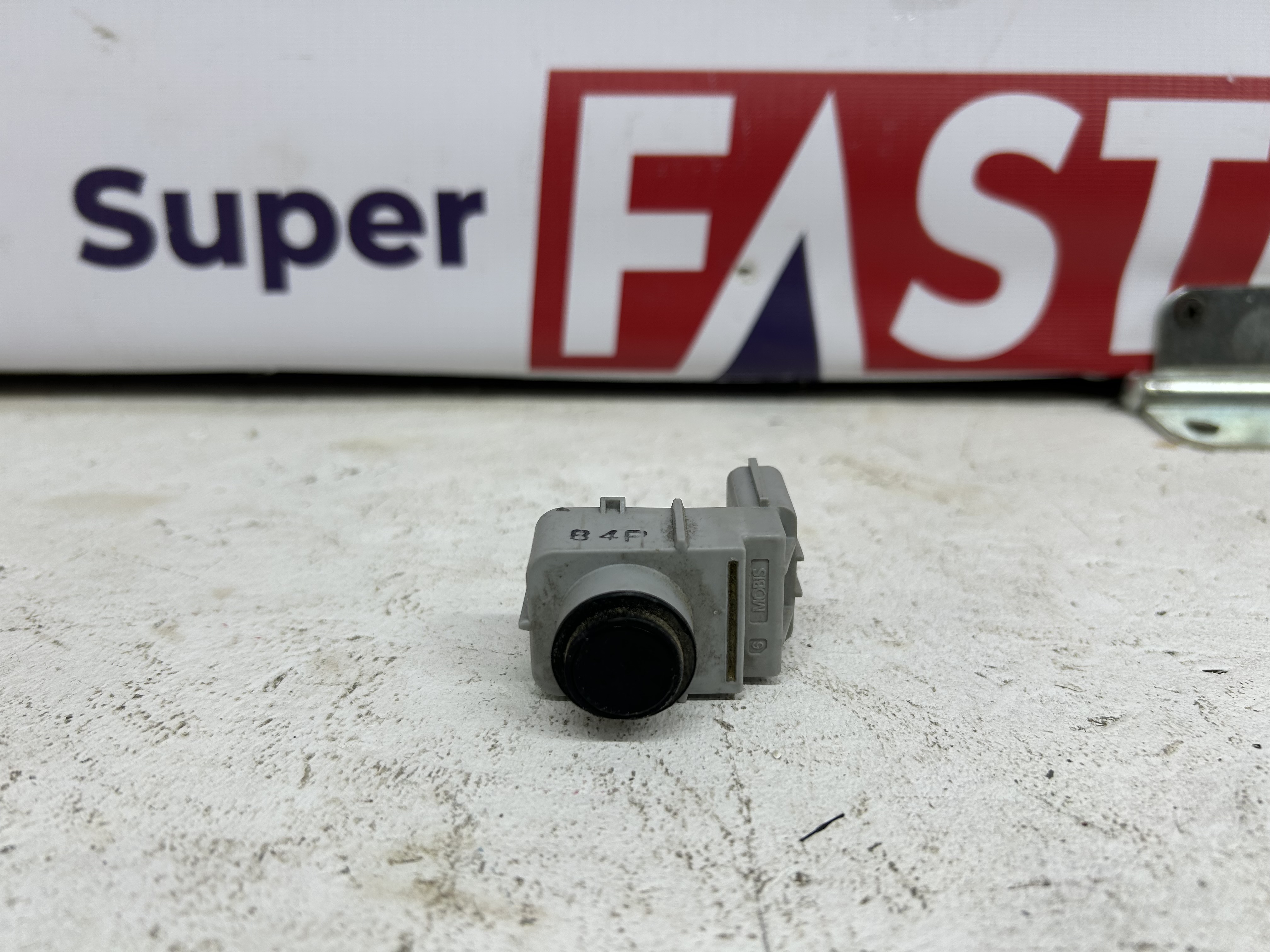 Датчик парковки Kia Quoris 957203T000