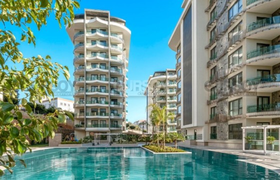 Квартира 1+1 в элитном комплексе  всего в 100 метрах от моря в Турции - фото 6