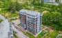 sovremennaya-meblirovannaya-kvartira-1-1-v-avsallare-v-komplekse-s-bogatoi-infrastrukturoi в Турции - фото 2