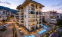 kvartira-1-1-v-elitnom-komplekse-v-centre-alani-vsego-600-m-do-morya в Турции - фото 2