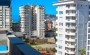 tri-novye-kvartiry-v-800-m-ot-morya-v-raione-dzhikdzhilli-49-118-m2 в Турции - фото 2