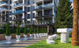 kvartiry-raznyx-planirovok-58-233-m2-na-stadii-stroitelstva-v-centre-alanii в Турции - фото 2