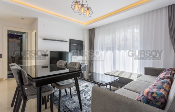 Квартира 1+1 в престижном комплексе, 55 м2 в центре Алании. в Турции - фото 9