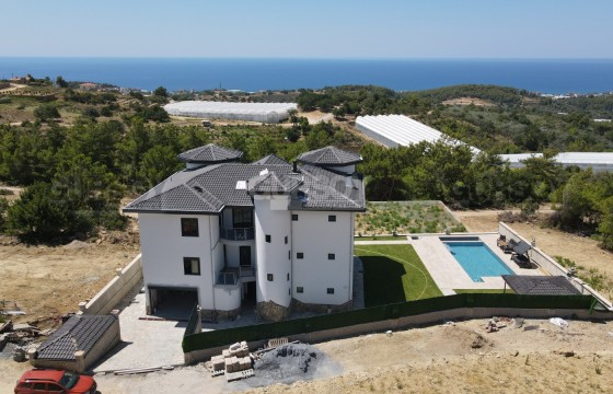 Приватная вилла 8+1 в районе Инжекум, 660 м2. в Турции - фото 1