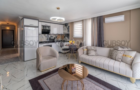 Просторная меблированная квартира 1+1 в центре Алании, 70м2 в Турции - фото 1