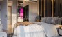 investicionnyi-proekt-s-kvartirami-ot-46-do-117-m2-i-villami-tomyuk-mersin в Турции - фото 2