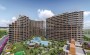 investicionnyi-proekt-s-kvartirami-ot-46-do-117-m2-i-villami-tomyuk-mersin в Турции - фото 2