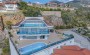 shikarnaya-meblirovannaya-villa-4-1-s-basseinom-i-voskhititelnym-vidom-na-more-v-tepe-400-m2 в Турции - фото 2
