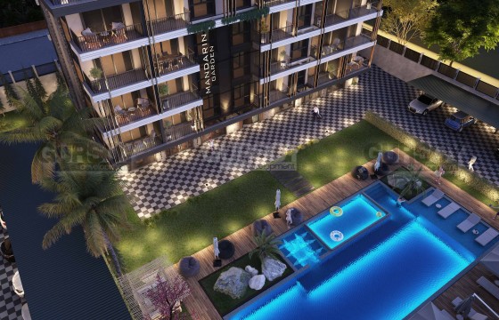 Инвестиционный проект с квартирами от 60 до 200 м2 в центре района Оба. в Турции - фото 1