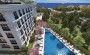 gotovyi-zhiloi-kompleks-v-200-metrakh-ot-mramornogo-morya-v-raione-buyukchekmedzhe-85m2-210m2 в Турции - фото 2