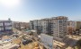apartamenty-1-1-s-vidom-na-more-v-rezidencii-premium-klassa-v-makhmutlare-65-m2 в Турции - фото 2