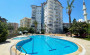 vidovye-apartamenty-21-v-raione-tosmur-115-m2 в Турции - фото 2