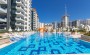 apartamenty-1-1-s-vidom-na-more-v-rezidencii-premium-klassa-v-makhmutlare-65-m2 в Турции - фото 2