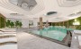 premialnyi-proekt-v-raione-altyntash-kvartiry-s-basseinom-na-terrase-vykhodom-v-sad-1-1-2-1-i-5-1-50m2-331m2 в Турции - фото 2