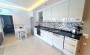 kvartira-1-1-s-bolshim-balkonom-50-m2-v-centre-raiona-oba в Турции - фото 2
