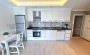 kvartira-1-1-s-bolshim-balkonom-50-m2-v-centre-raiona-oba в Турции - фото 2