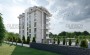 kvartiry-1-1-i-4-1-v-stroyashemsya-komplekse-v-okurdzhalare-63-180-m2 в Турции - фото 2