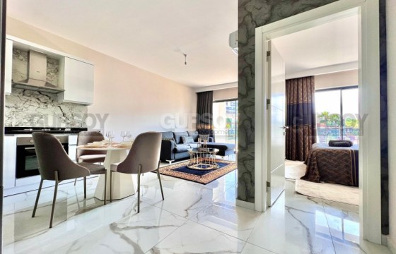 Уютная квартира 1+1 с видом на море в районе Каргыджак, 61 м2. в Турции - фото 12
