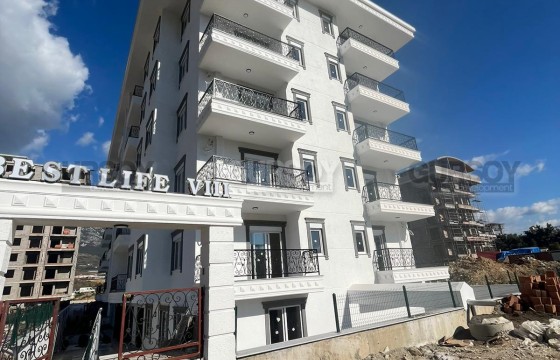 Новая просторная квартира 1+1 с мебелью в Махмутларе, 57 м2. в Турции - фото 1