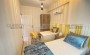 stilnaya-kvartira-2-1-vsego-v-350-m-ot-morya-v-makhmutlare-105-m2 в Турции - фото 2