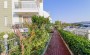 dvukhurovnevye-apartamenty-s-vidom-na-more-v-konakly-110-kv-m в Турции - фото 2