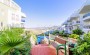 dvukhurovnevye-apartamenty-s-vidom-na-more-v-konakly-110-kv-m в Турции - фото 2