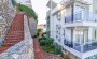 dvukhurovnevye-apartamenty-s-vidom-na-more-v-konakly-110-kv-m в Турции - фото 2