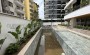 kvartira-1-1-v-novom-zhilom-komplekse-vsego-v-100-m-ot-plyazha-kleopatry-53-m2 в Турции - фото 2