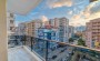 prekrasnaya-kvartira-1-1-s-mebelyu-55-m2-v-makhmutlare в Турции - фото 2