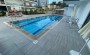 apartamenty-1-1-v-novom-komplekse-v-400-metrakh-ot-morya-v-avsallare-58m2 в Турции - фото 2