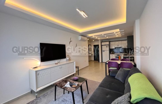 Уютная меблированная квартира 1+1 в районе Авсаллар, 65м2 в Турции - фото 2