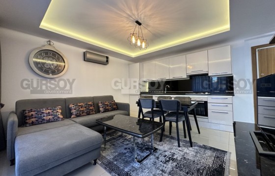 Меблированные апартаменты в районе Клеопатра 1+1, 55м2 в Турции - фото 1